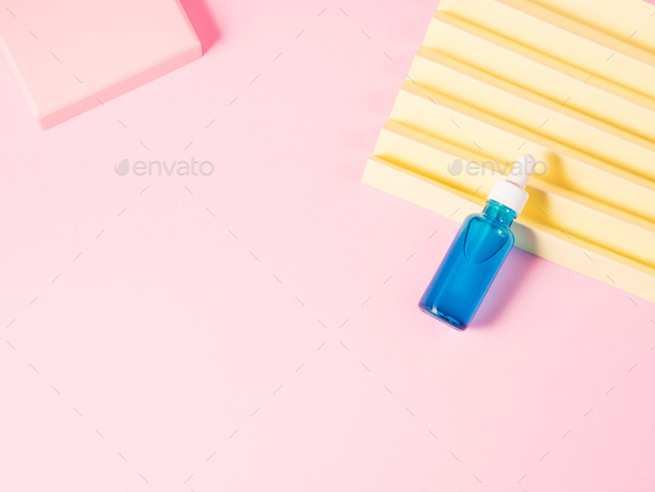 Hyaluronic acid serum generic bottle on pink geometric background