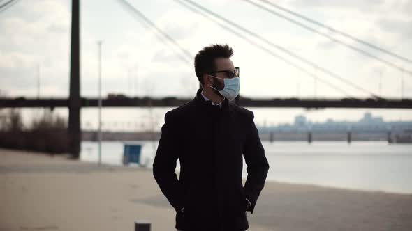 Covid19 Lockdown In City.Businessman Walking In Face Mask On Coronavirus Lockdown.Health And Safety alt