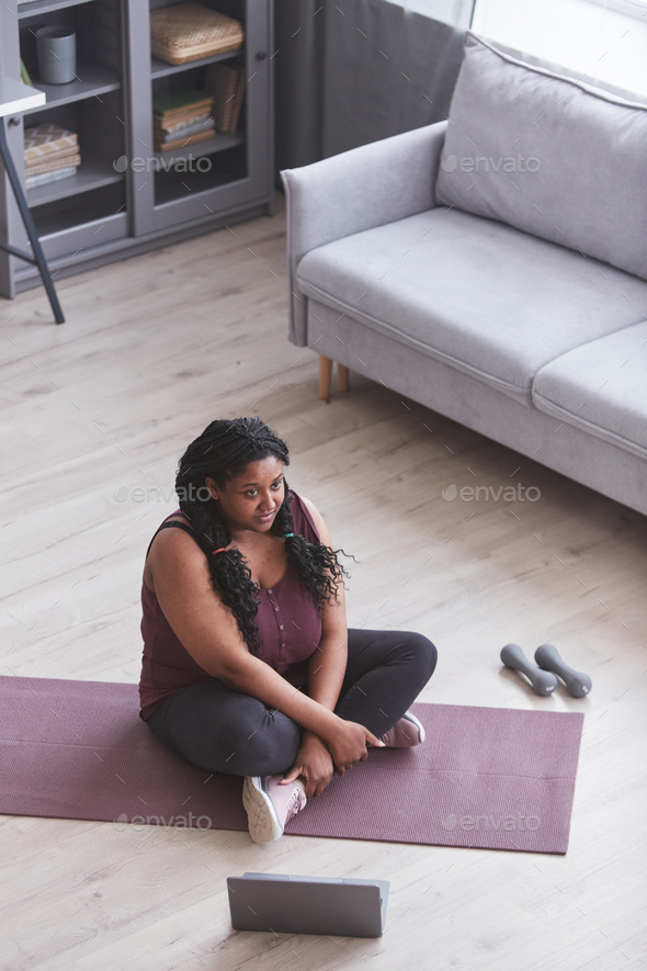 Overweight African American Woman on Yoga Mat