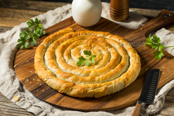 Homemade Spinach and Feta Spanakopita Swirl Stock Photo by bhofack2