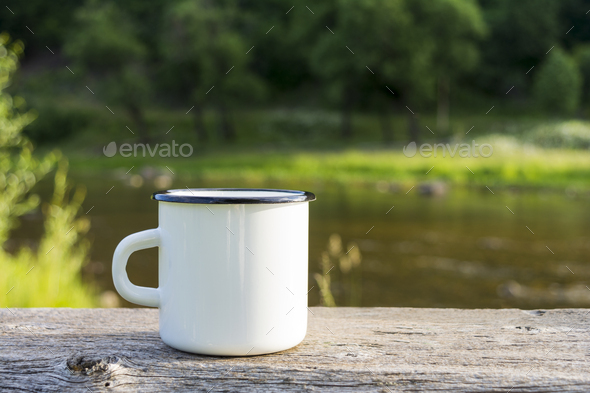 Download Placeit White Campfire Enamel Mug Mockup River View Stock Photo By Tasipas