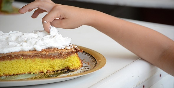 Child Eating Cream Cake 1