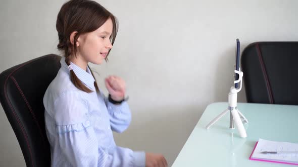 Young Girl Dancing and Making Video By the Smartphonemonopod and App