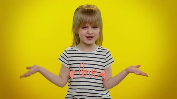 Confused Blonde Child Girl Raising Hands in Indignant Expression Asking Why What Reason of Failure alt