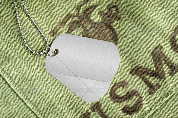 Dog tags on military uniform - Stock Photo - Images