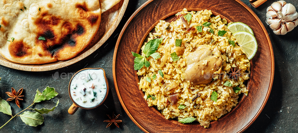 Pakistani chicken biryani rice, top view, copy space - Stock Photo - Images