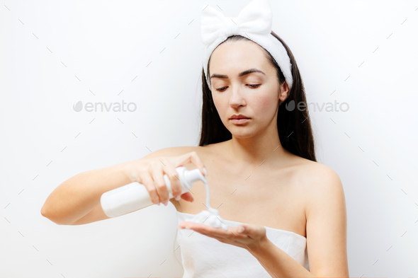 woman washing face foam