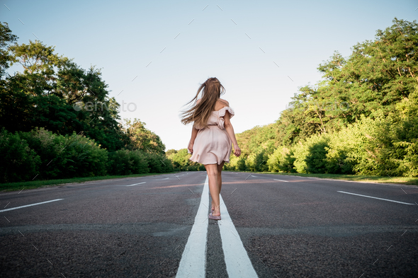 New way, new start, New year resolution, challenge, choice or change concept. Young Woman walking on - Stock Photo - Images