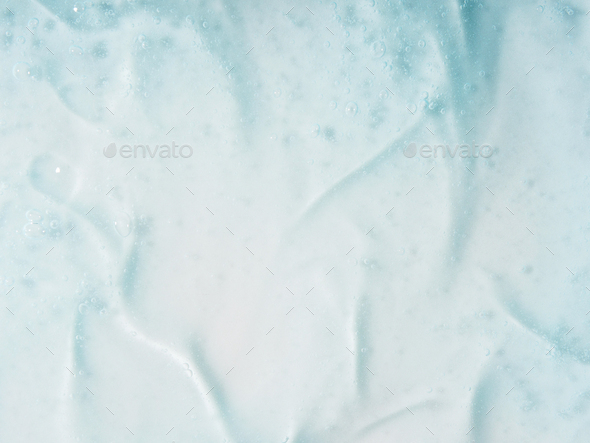 Gel serum face cleanser lotion textured light blue background