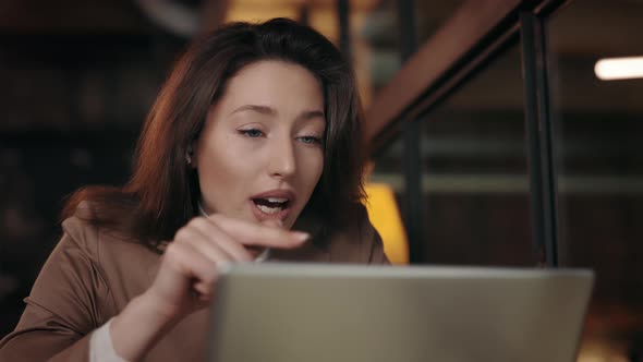 Young Business Lady Discussing Project with Colleagues on Online Meetup alt