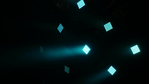 Lights in Night Club. Spotlight, Head, Scanners. Lighting Equipment. Blue Lights in Dark Stage From