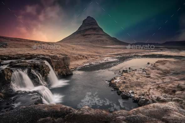 Northern Lights Aurora Borealis Over Kirkjufell Waterfall In Iceland