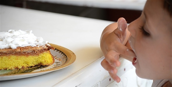 Child Eating Cream Cake 2