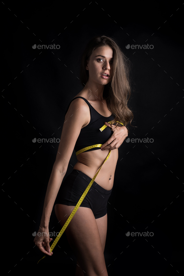 Woman Measuring Her Bra Size with Tape Measure Stock Image - Image
