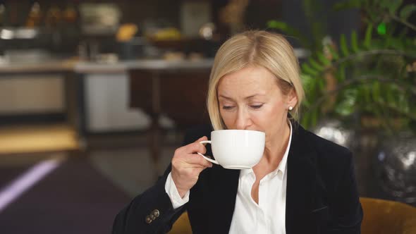 Business Lady Sit Having Rest After Hard Working Day Drinking Coffee