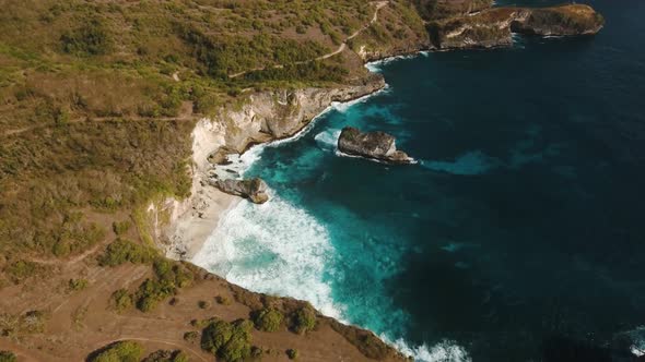 Cliffs Sea and Waves at Nusa Penida Bali Indonesia alt