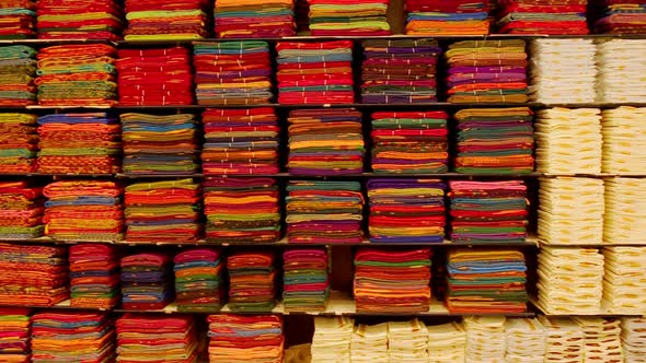 Sari Shop. Indian Traditional Women's Sari clothing on Market. Buying Wedding Sari in India.