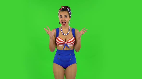 Beautiful Girl in a Swimsuit with Shocked Surprised Wow Face Expression. Green Screen alt