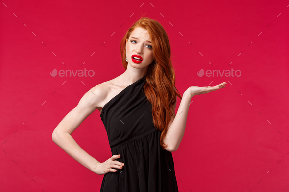 Whats your problem, so what. Arrogant and pissed-off snobbish sassy redhead woman in elegant black