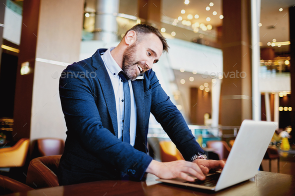 Busy businessman Stock Photo by Pressmaster | PhotoDune