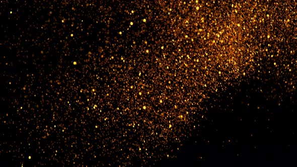 Golden Glitter Background in Super Slow Motion at 1000Fps alt