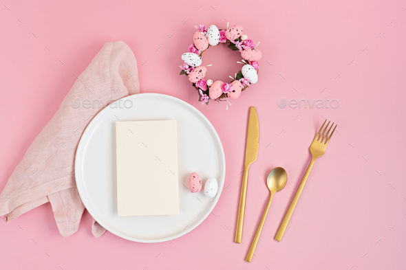 Flat lay with mockup menu and easter decoration. Easter wreath and blank card