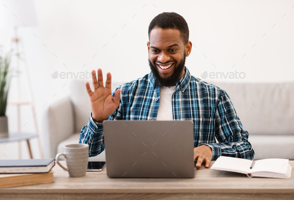 Black Business Guy At Laptop Video Calling Sitting In Office