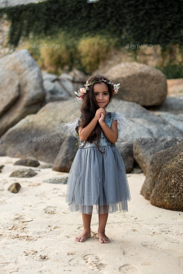 Premium Photo | Small girl pose with horns hands, beauty. child in summer  dress on natural landscape, fashion.