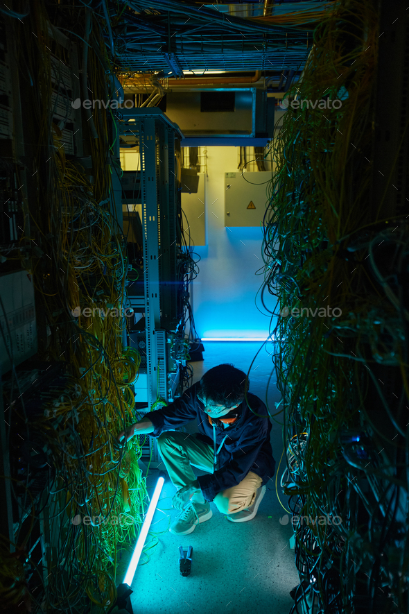 Young Man Working with Network Servers