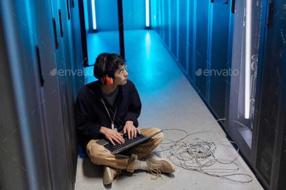 Young Network Engineer in Server Room