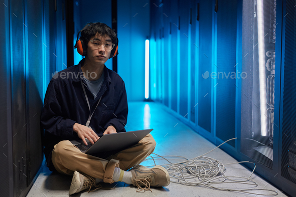 Asian Network Engineer in Server Room