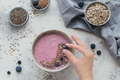 Pink Yogurt Smoothie Bowl made with Fresh Blueberry and Seeds - PhotoDune Item for Sale