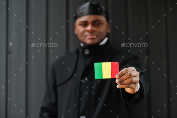 Young african man hold flag - Stock Photo - Images