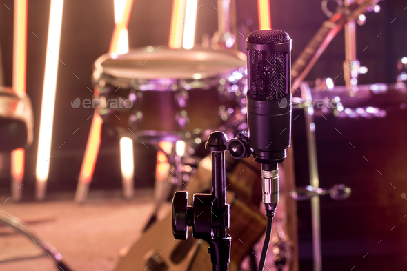 The microphone in a recording Studio or a concert hall close up. Stock  Photo by puhimec