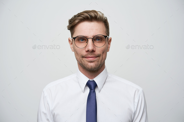 Attractive male with fashioned hairstyle Stock Photo by nakaridore