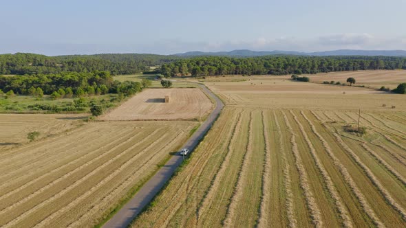 Driving through the countryside of Palau Sator Catalonia, Spain. Aerial tracking shot. Freedom Conce alt