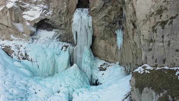 Drone Approaching the Sultan Waterfall Frozen in Ice in the JilySu Tract alt