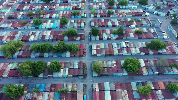 Lots of Multicolored Containers and Garages in the Warehouse alt