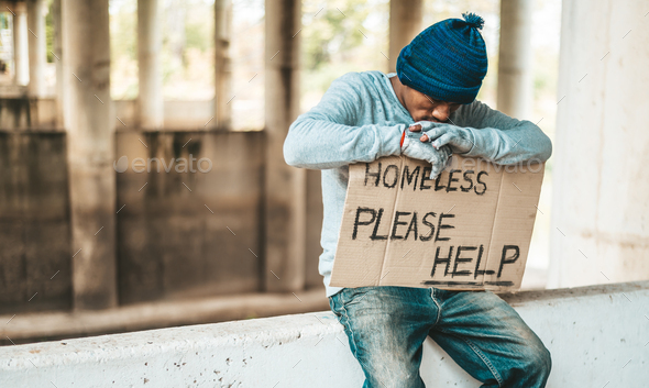 Beggars Sit On Barriers With Homeless Please Help Messages. Stock Photo ...