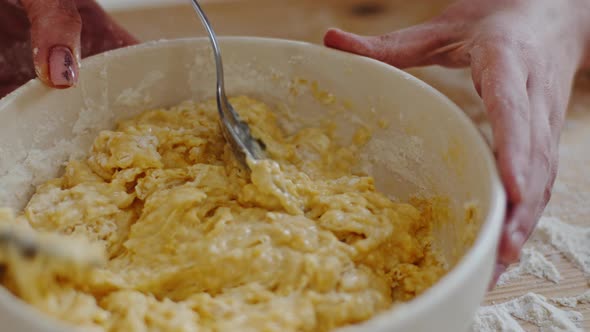 Closeup Two Pairs Female Hands Unrecognizable Child and Mother Holding Iron Spoons Prepare Knead alt