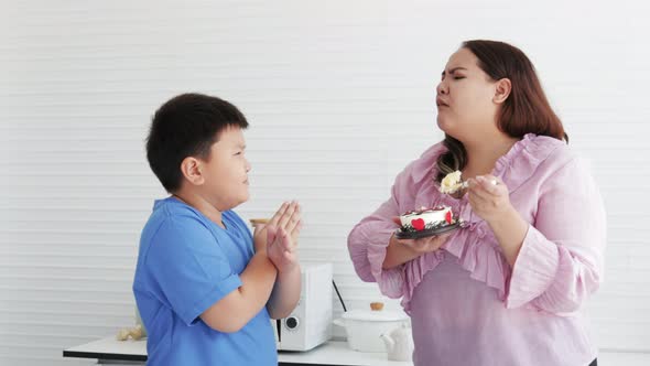 Son forbids mom from eating cake. junk food, unhealthy