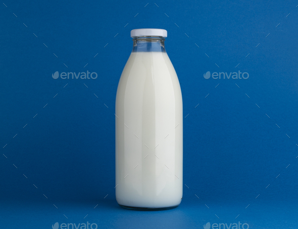 Glass Milk Bottle Mock Up On Blue Background Stock Photo By Xamtiw