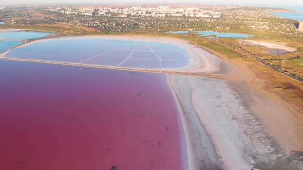 Wonderful Flight Over a Pink Salty Lake at Sunset in the Evening alt