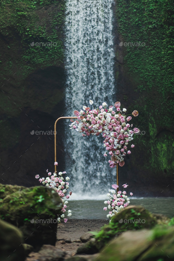 Metal Square Wedding Arch Decorated With Pink And Coral Colored Flowers Anthurium Orchids And Roses Stock Photo By Olegbreslavtsev