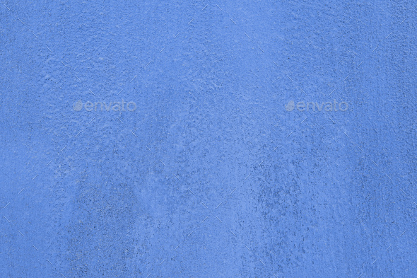 Traditional classic moroccan blue color background in Chefchaouen. Clay  wall texture. Stock Photo by olegbreslavtsev