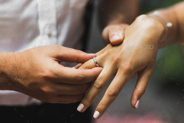 Image of Women Hand With Engagement Ring Close Up View In Textured  Background-EE768909-Picxy