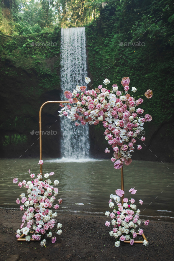 Metal Square Wedding Arch Decorated With Pink And Coral Colored Flowers Anthurium Orchids Stock Photo By Olegbreslavtsev