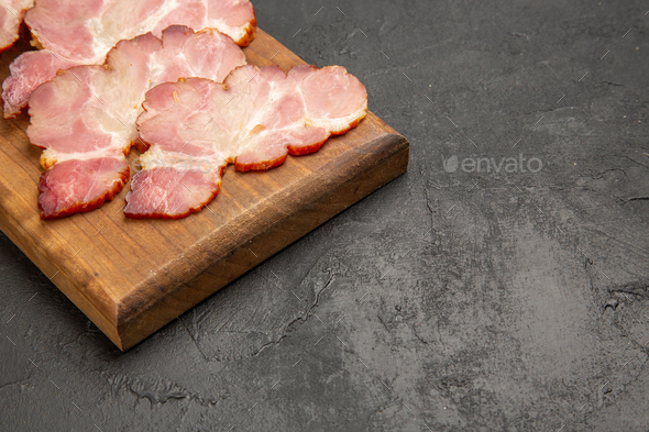front view sliced ham on wooden desk and the grey background photo color meat food meal raw pig