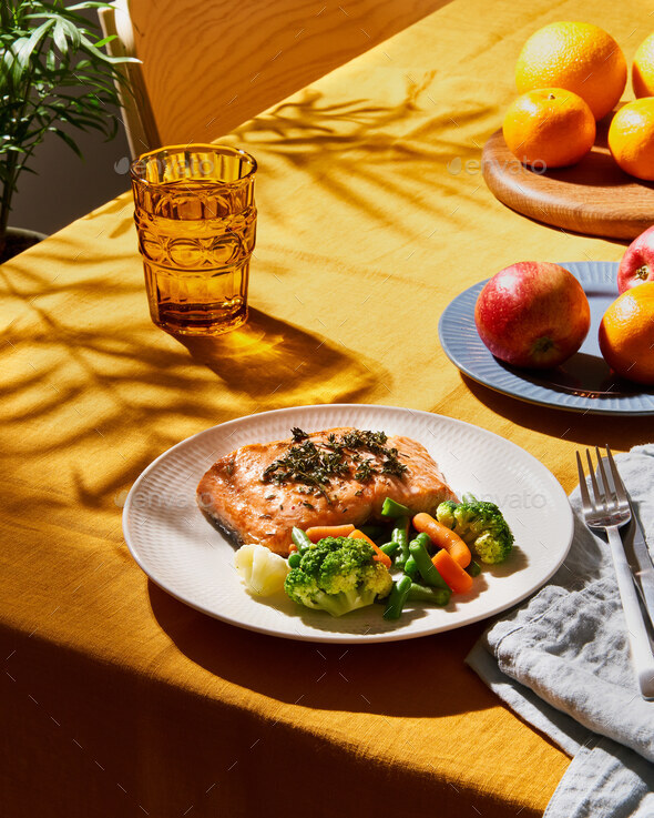 Bright food with salmon vegetables. Summer or spring sunny day or evening. Vibrant concept - Stock Photo - Images