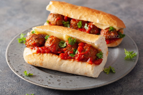 meatball sub sandwich with cheese and marinara tomato sauce. american italian fast food
